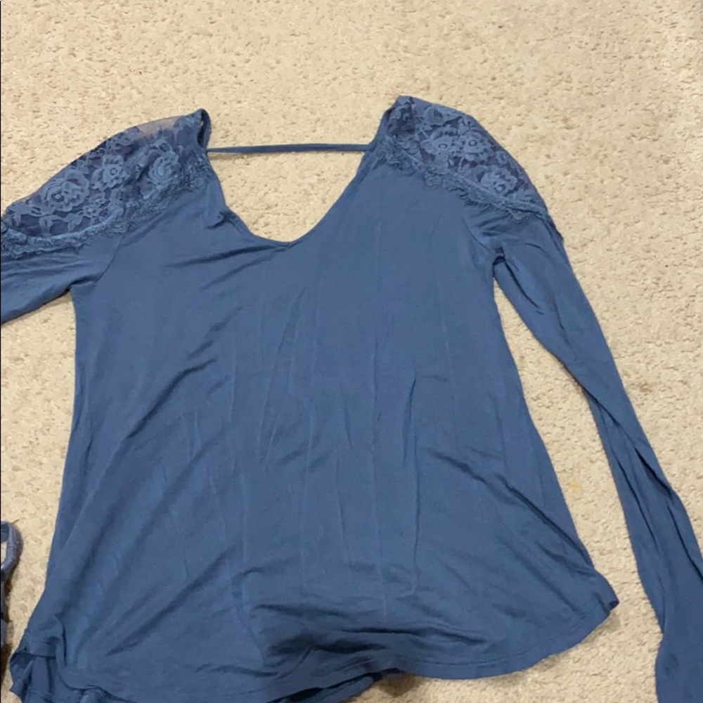 Blue shirt with laced shoulders. American Eagle